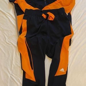 Men’s windbreaker pants by adidas, side medium, but run on the larger size